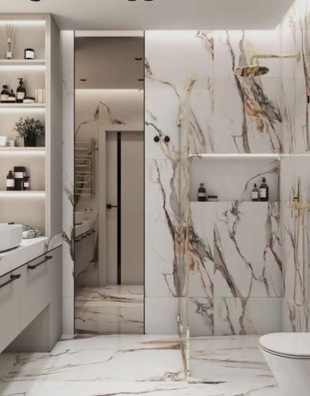 Mermer dokulu yüzeyler ve aydınlatma detaylarıyla planlanmış banyo